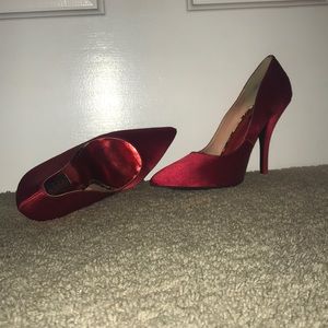 Two pairs of “Frederick’s of Hollywood” heels